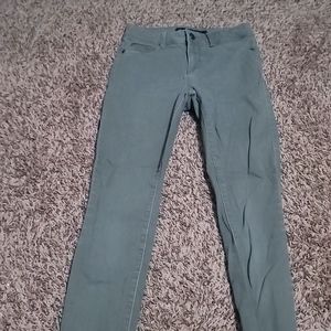 Green super skinny jeans